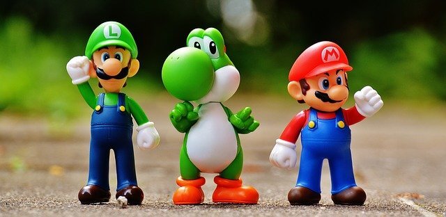 Image of action figures of Mario, Luigi and Yoshi